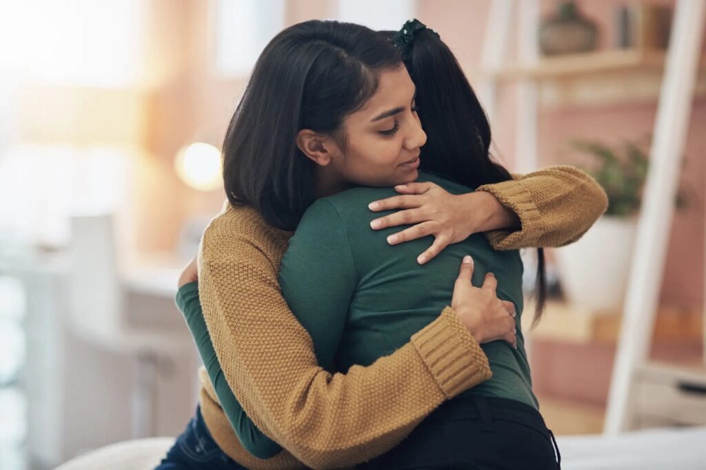 2 women hugging